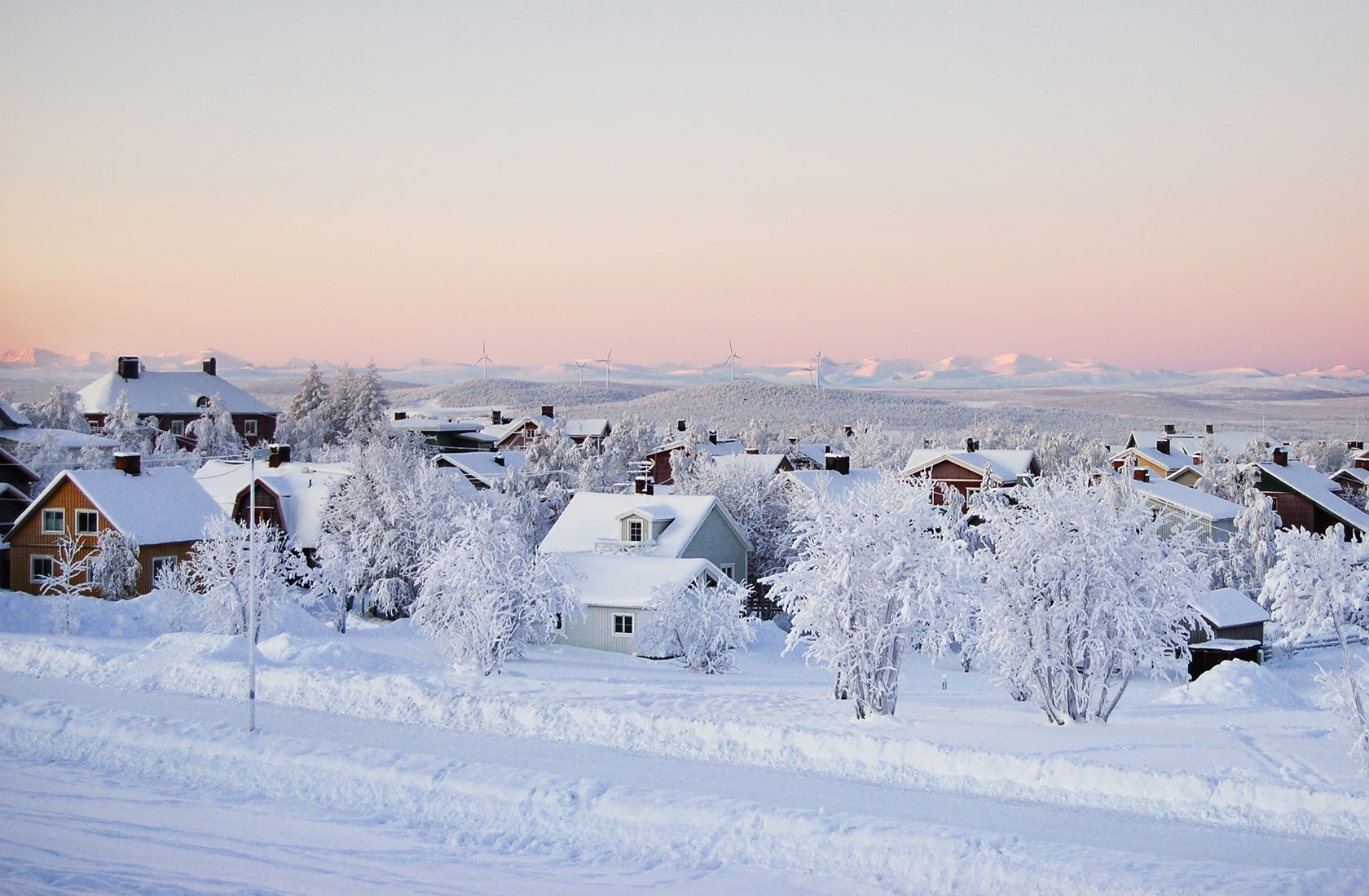 cabins covered in snow
