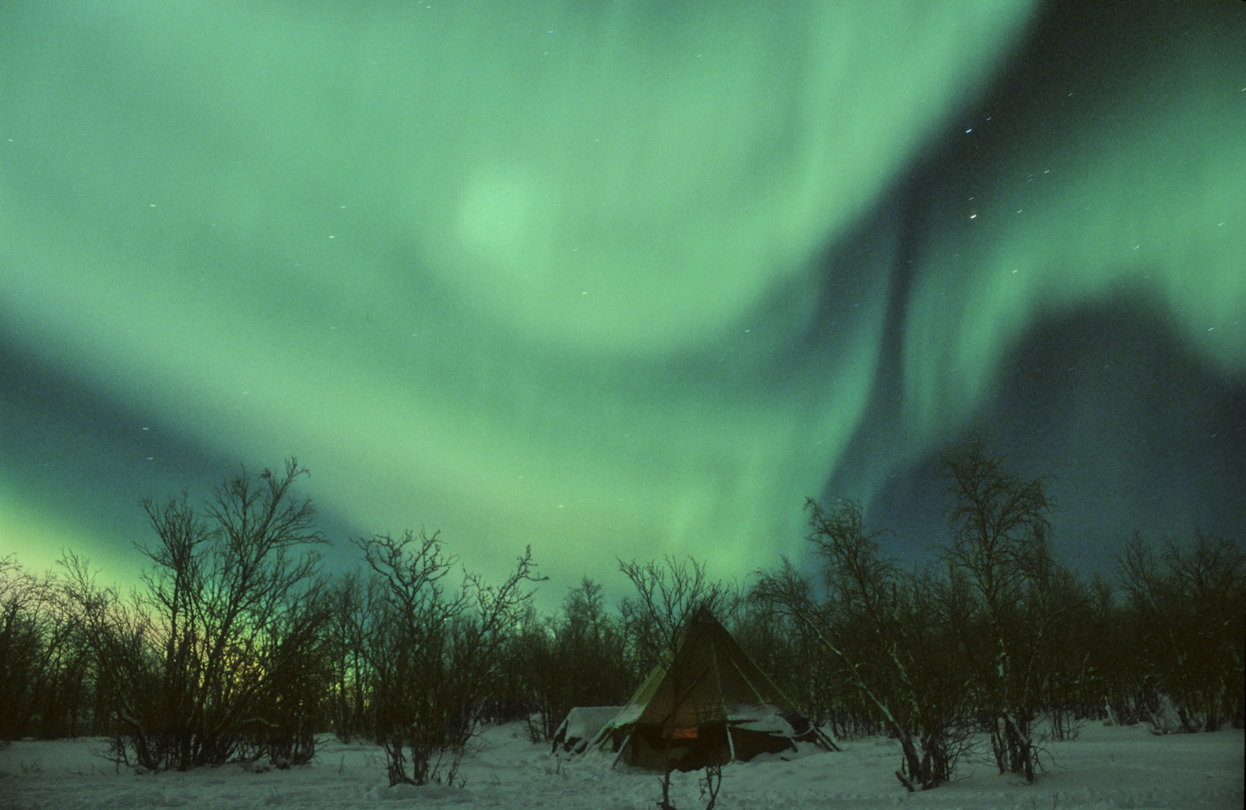 northern lights over teepee
