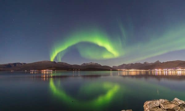 northern lights over the mountains
