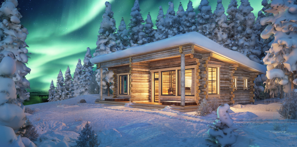 log cabin covered in snow with northern lights above