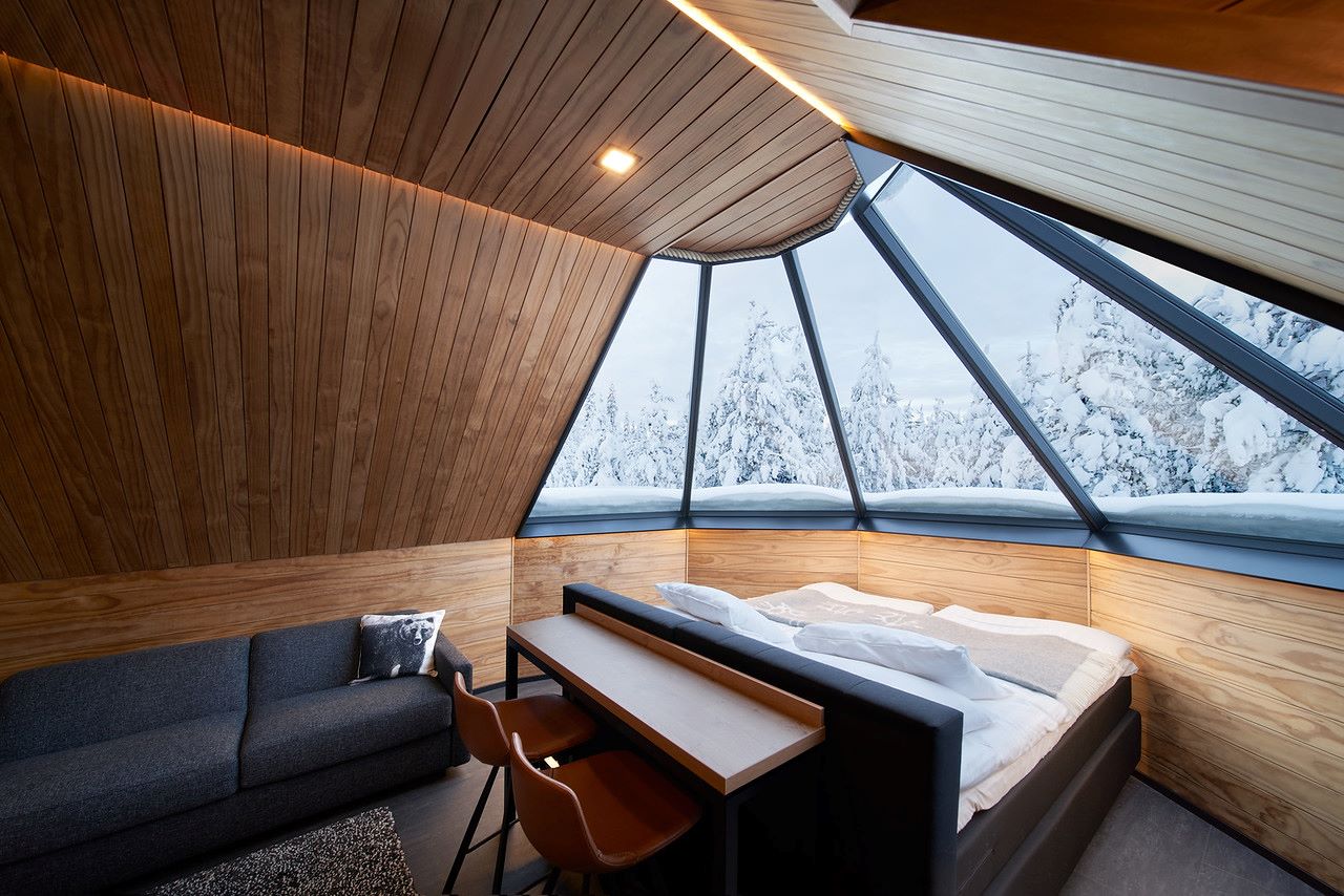 aurora cabin with glass roof above the bed