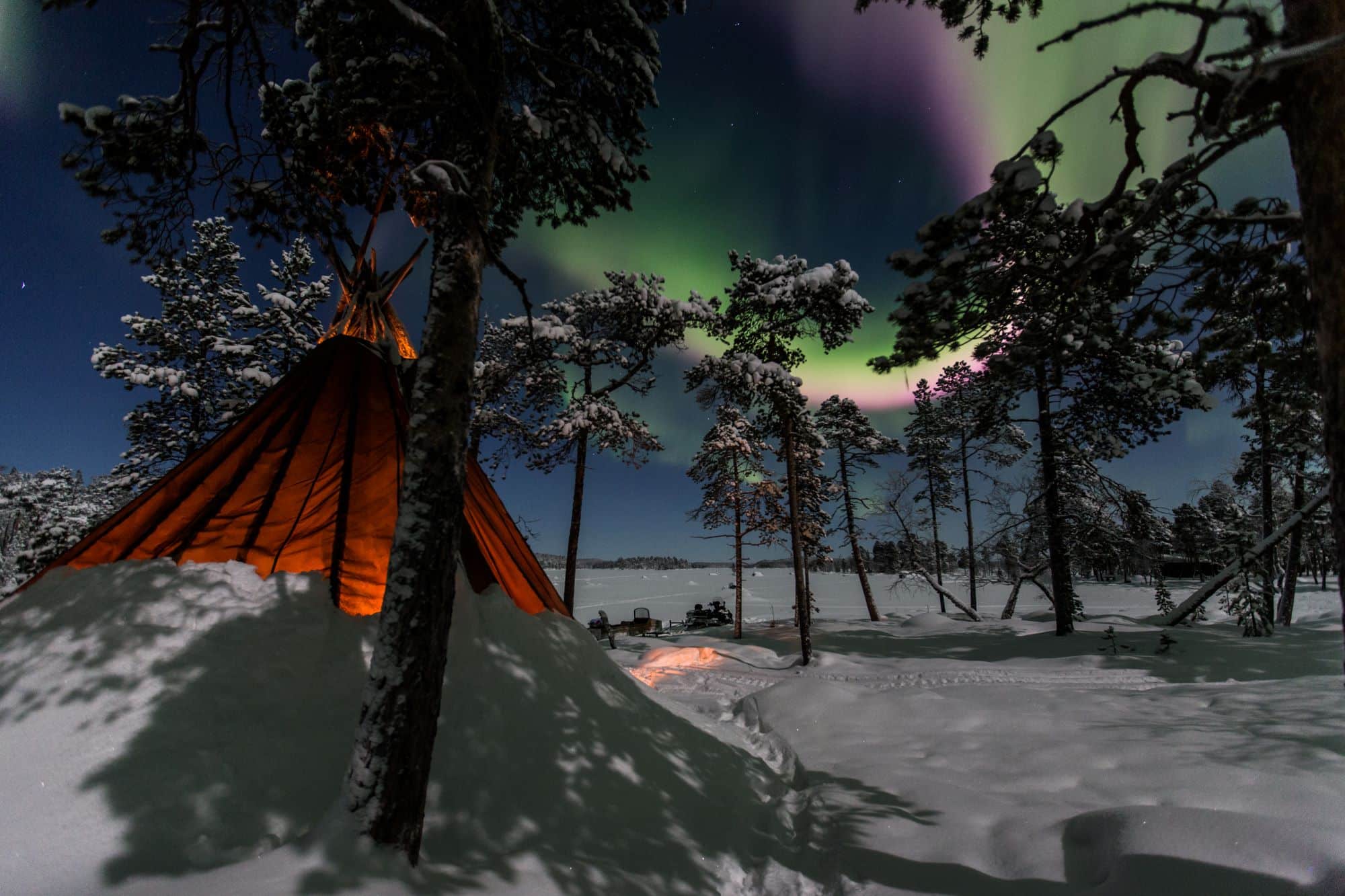 kota tent with northern lights above