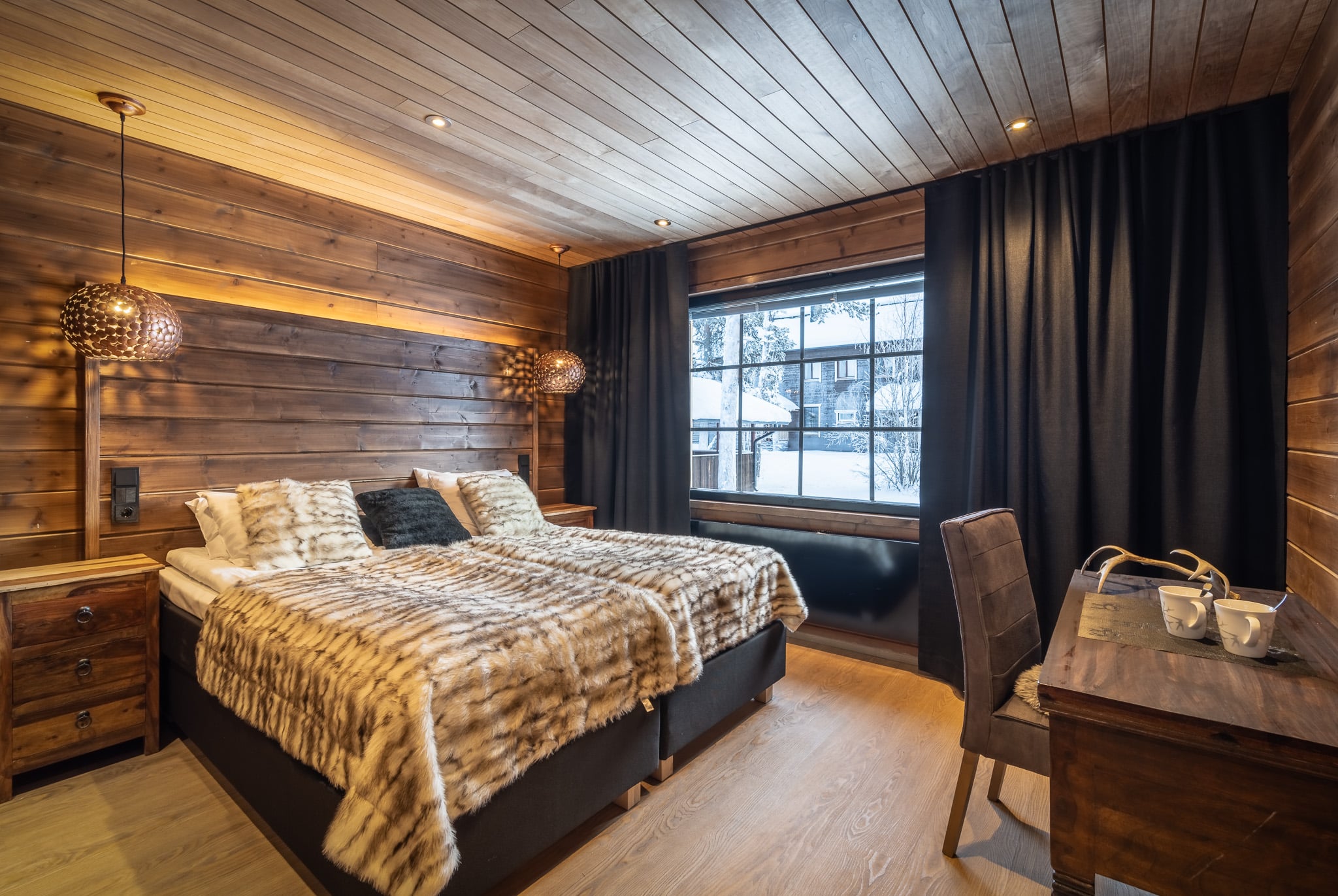 double bedroom in log cabin