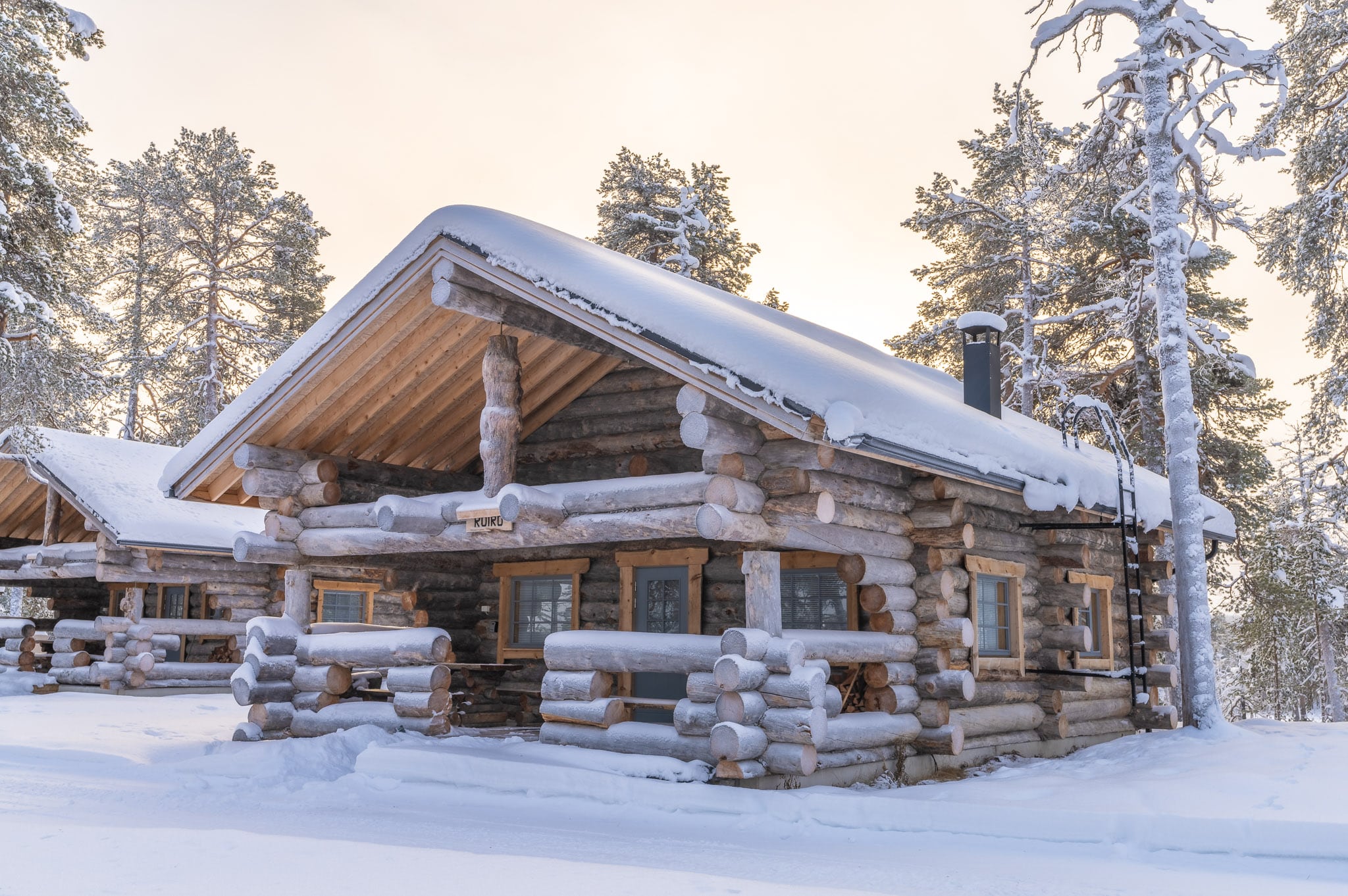 log cabin in the snow