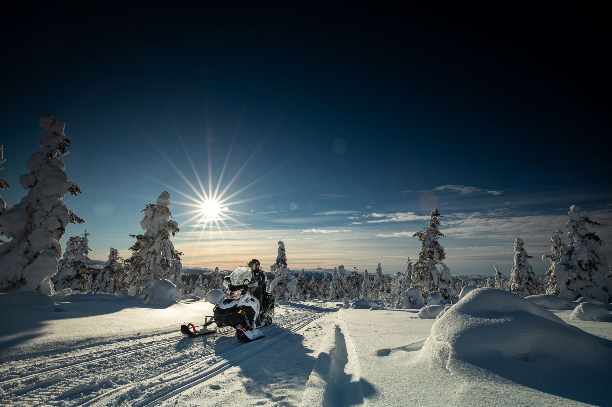 snowmobiling on a sunny day