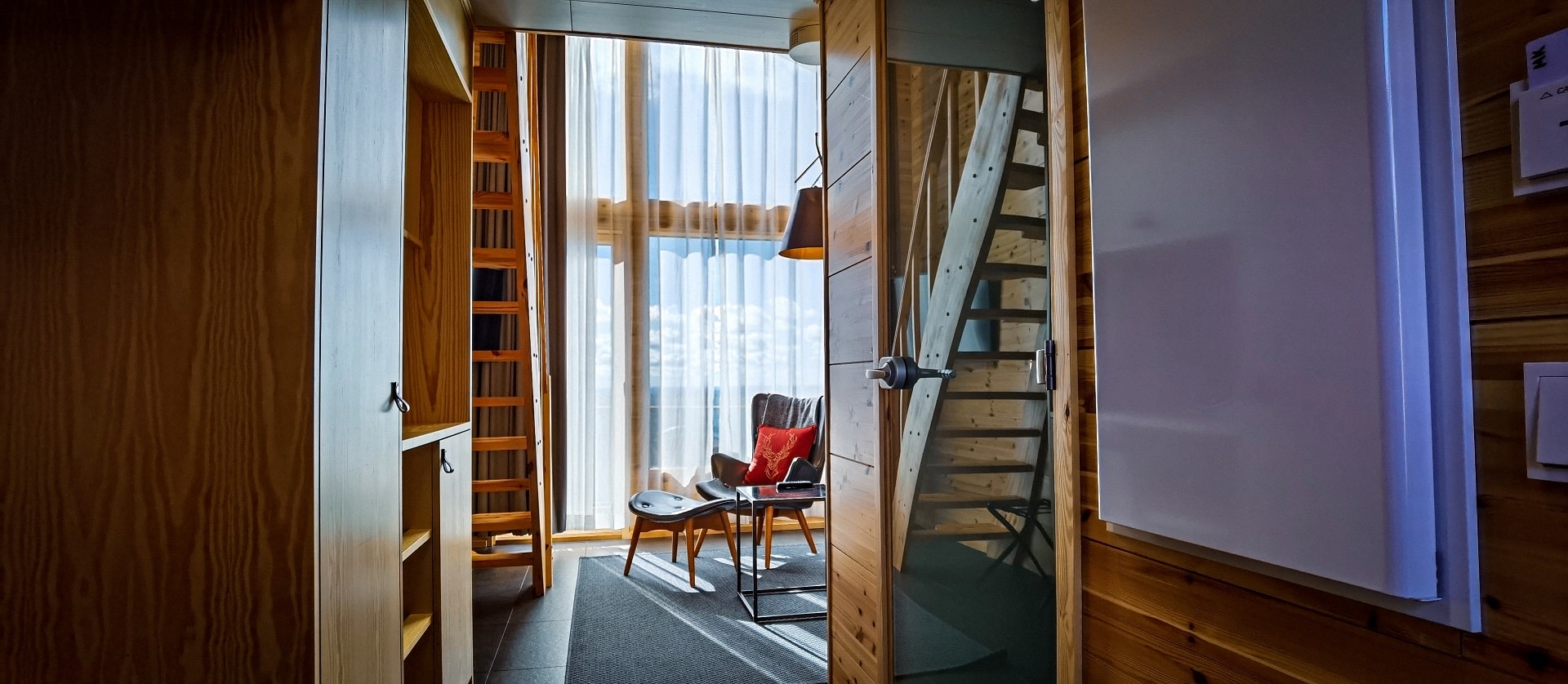 armchair in accommodation by the window