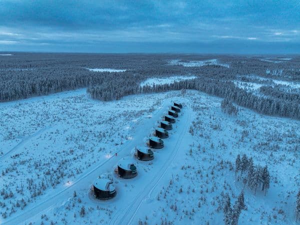igloos in a line in the snow