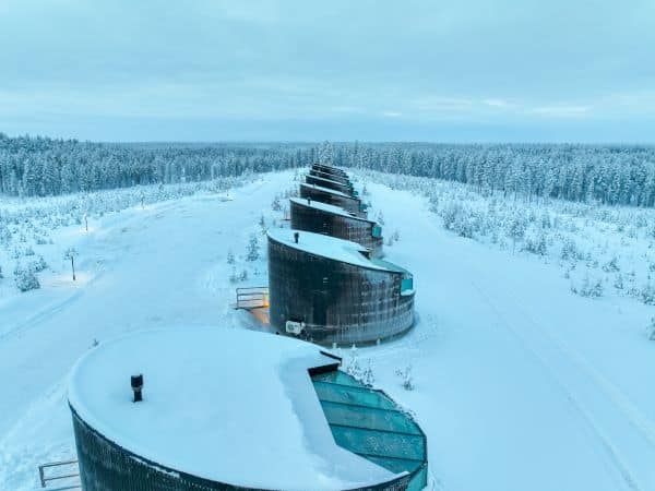igloos in a line in the snow