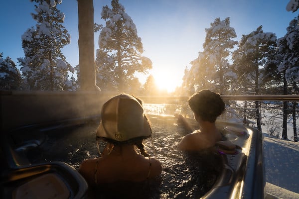 2 people sat in hottub