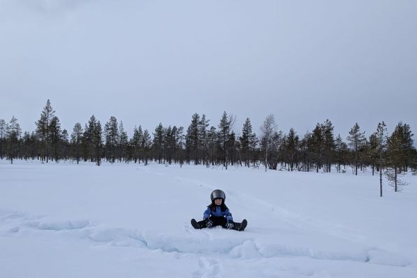 Child sat in the snow