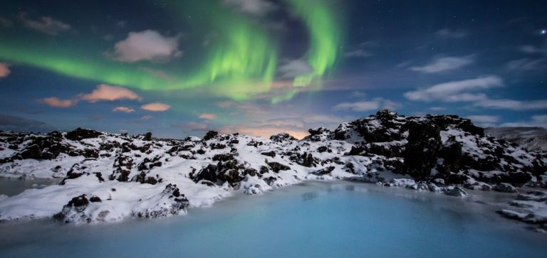 northern lights over blue lagoon