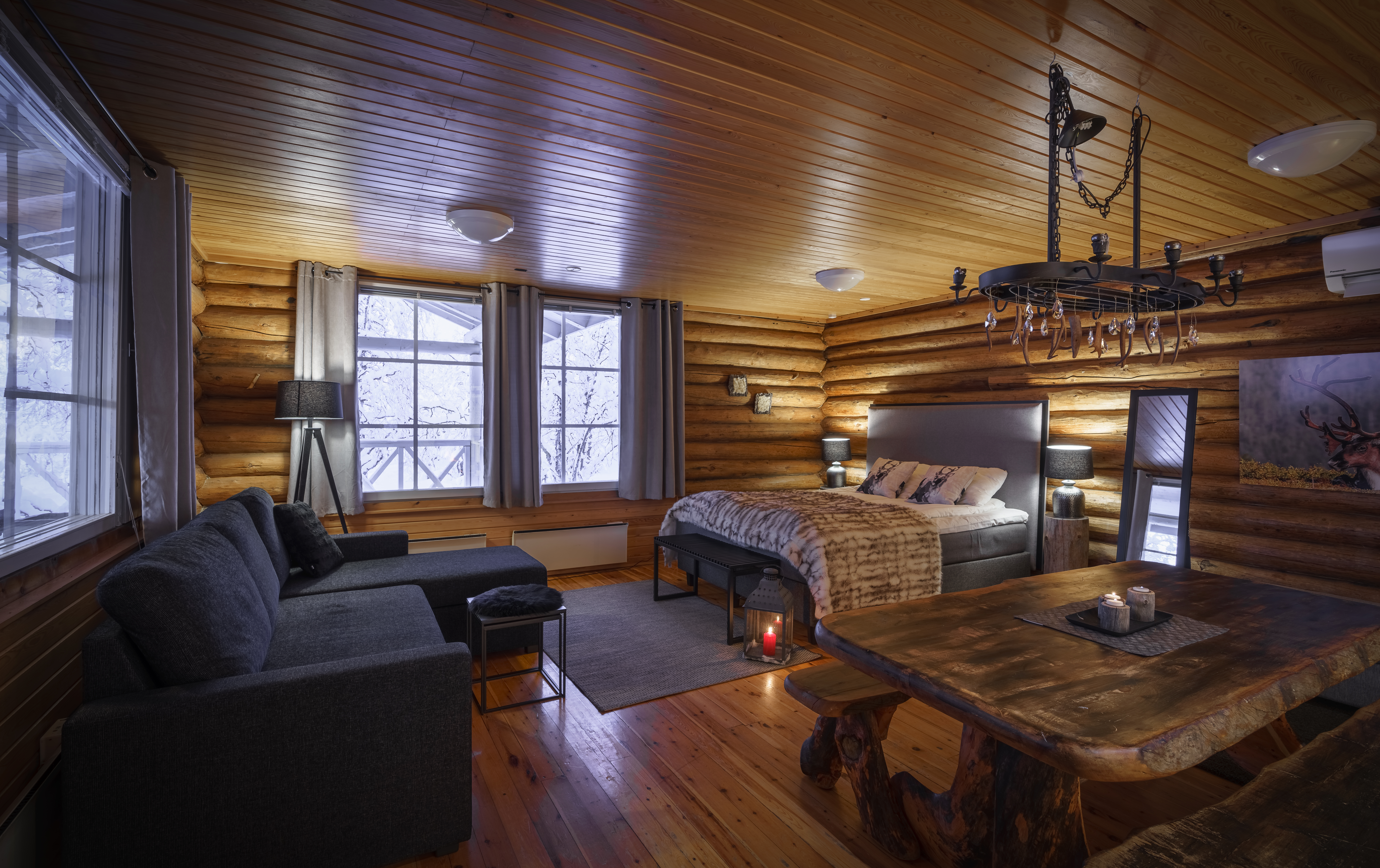muotka double bedroom with sofa and dining area