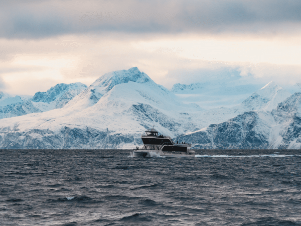 boat with mountains in background