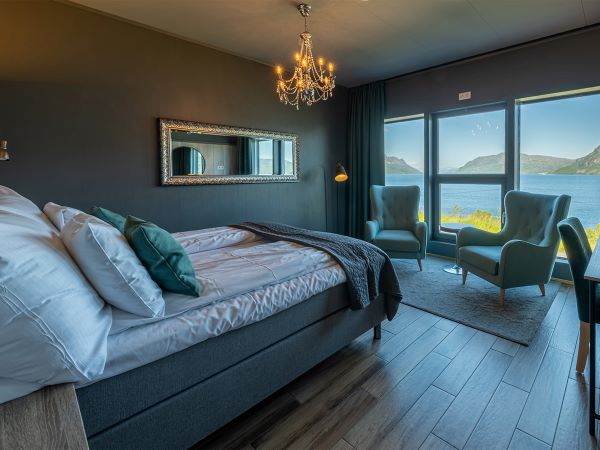 double bedroom with sea and mountain view