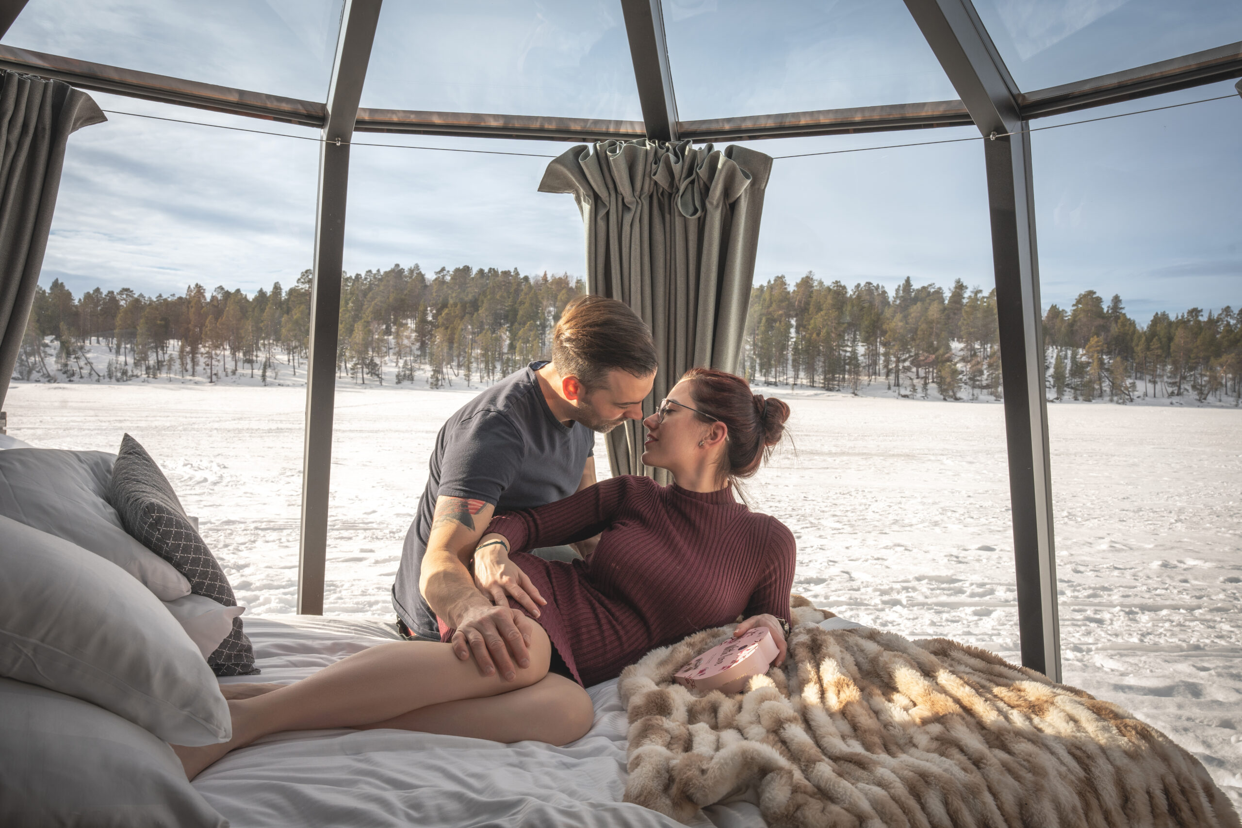 couple on bed in igloo