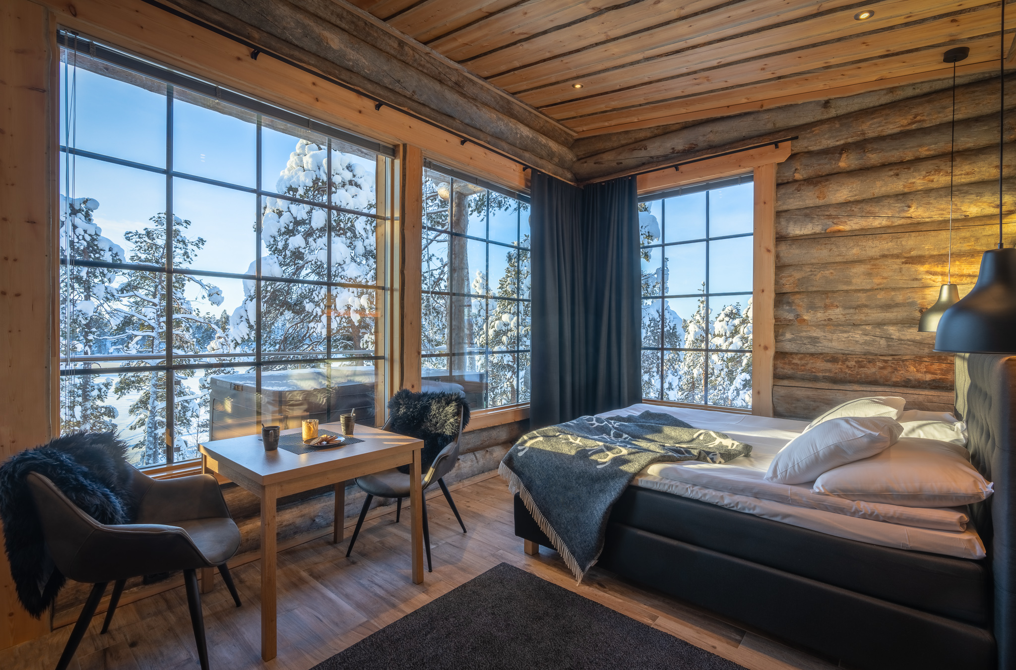 nangu bedroom with view of forest