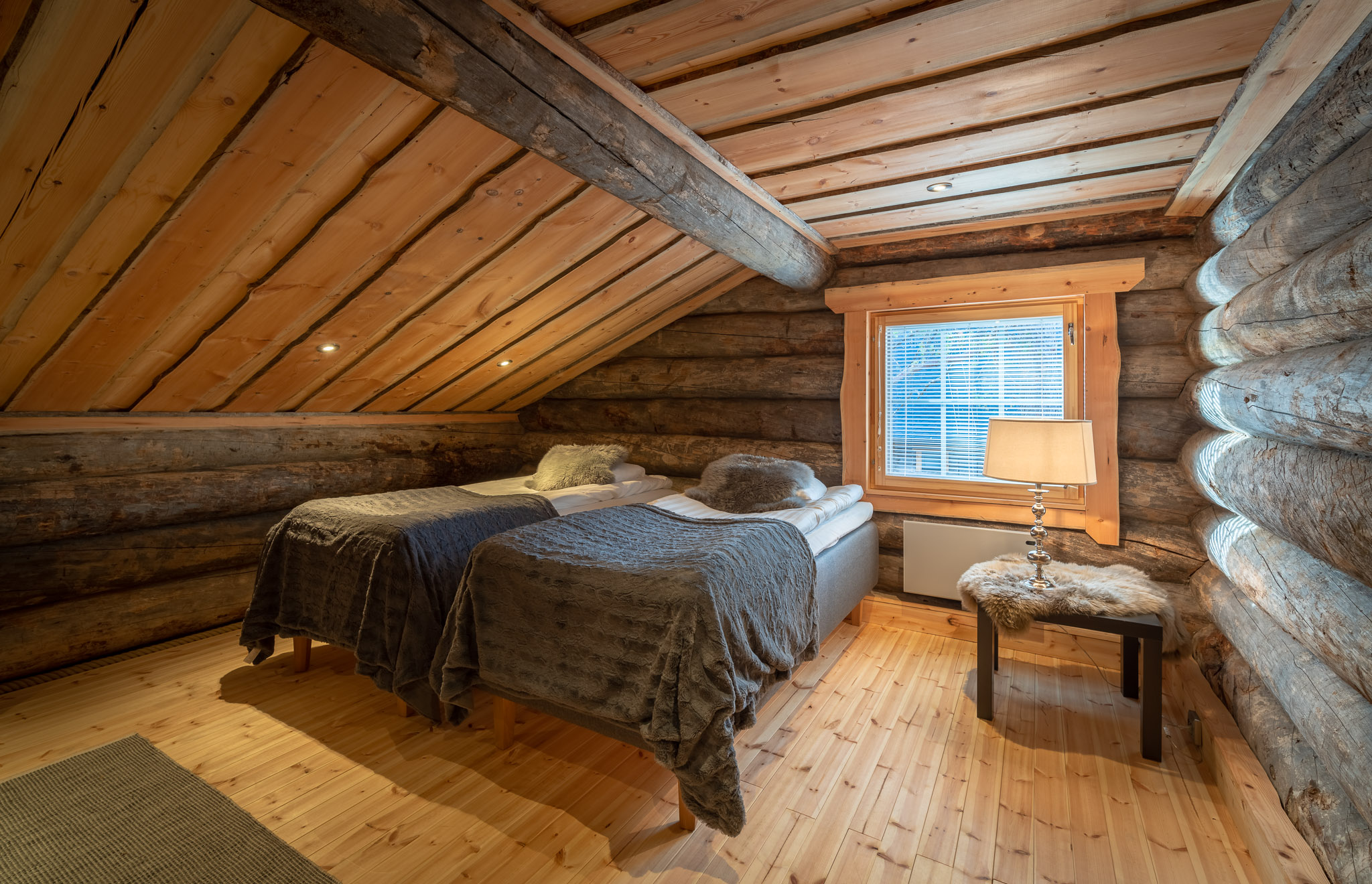 log cabin bedroom with single beds