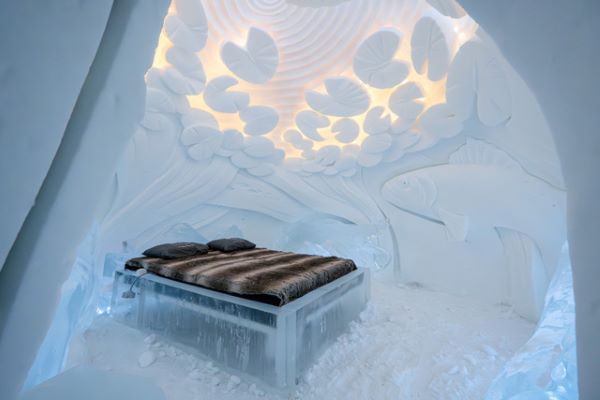 bed made of ice in a snow room