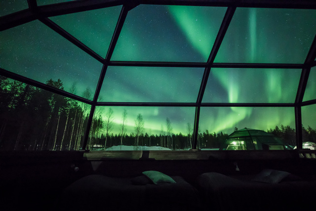 glass igloo with northern light view