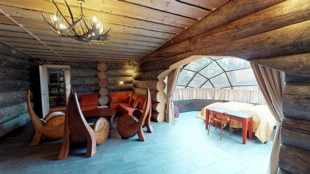 living area and view of glass igloo inside kelo