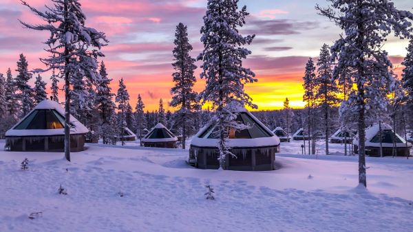 sunset view of glass igloos
