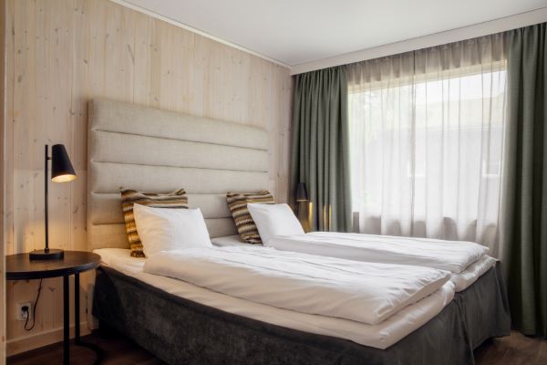 double bed in hotel room