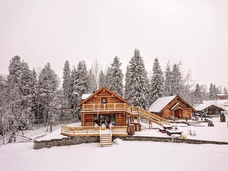snow covered cabins