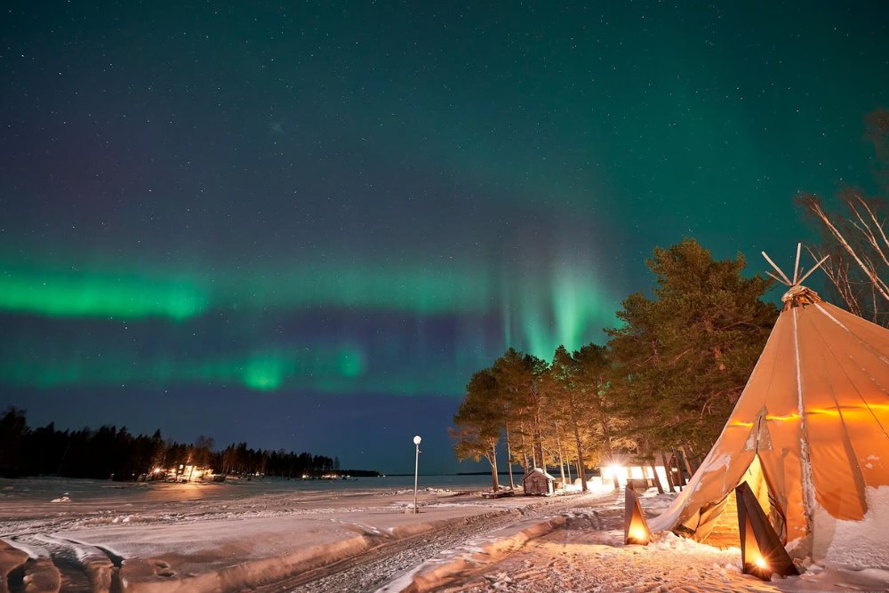 northern lights above river