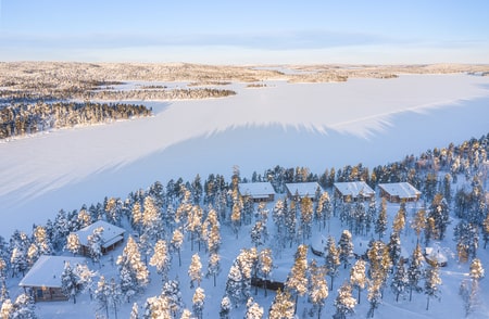 aerial view of cabins in the forest at nangu