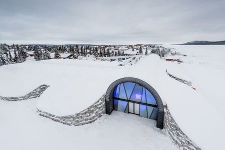 snow covered entrance to the ice hotel