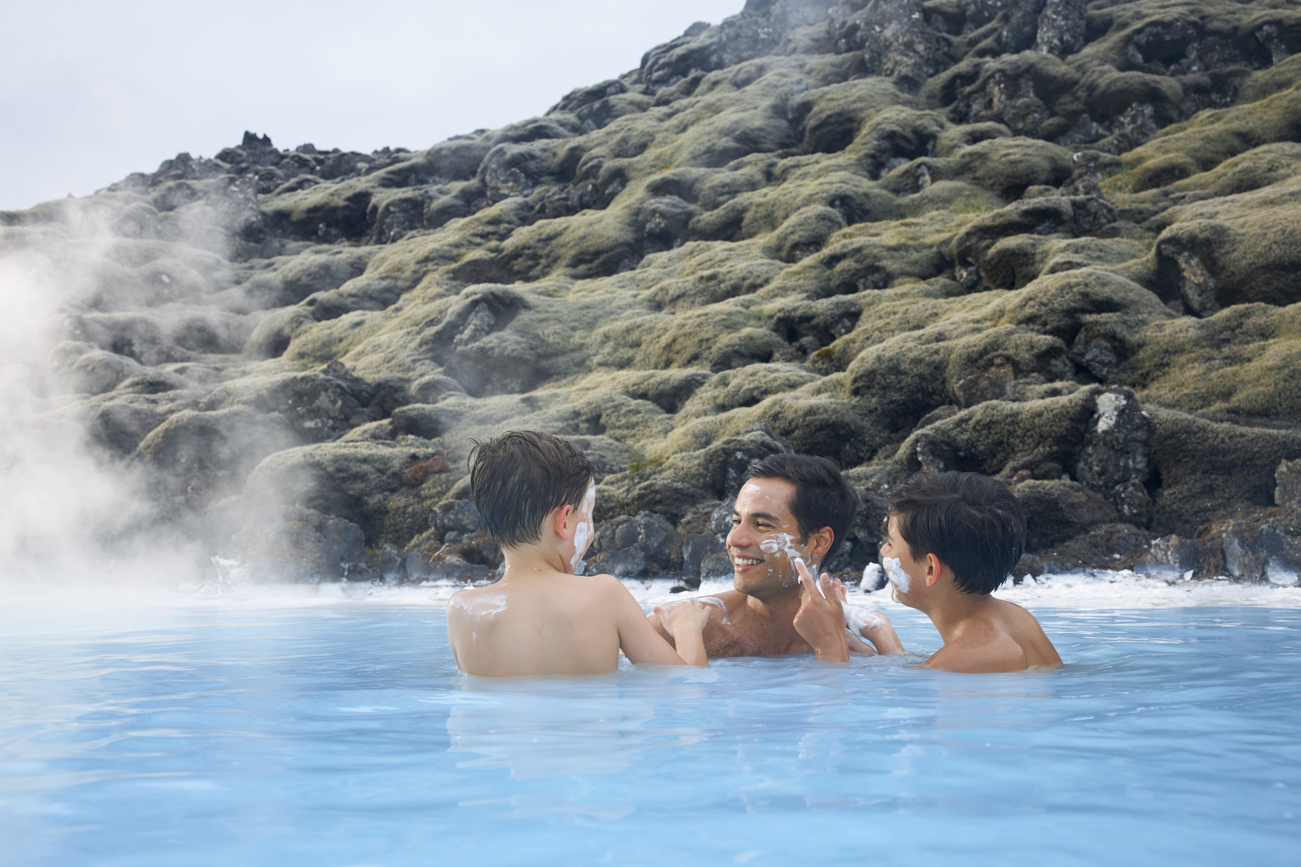 people in blue lagoon